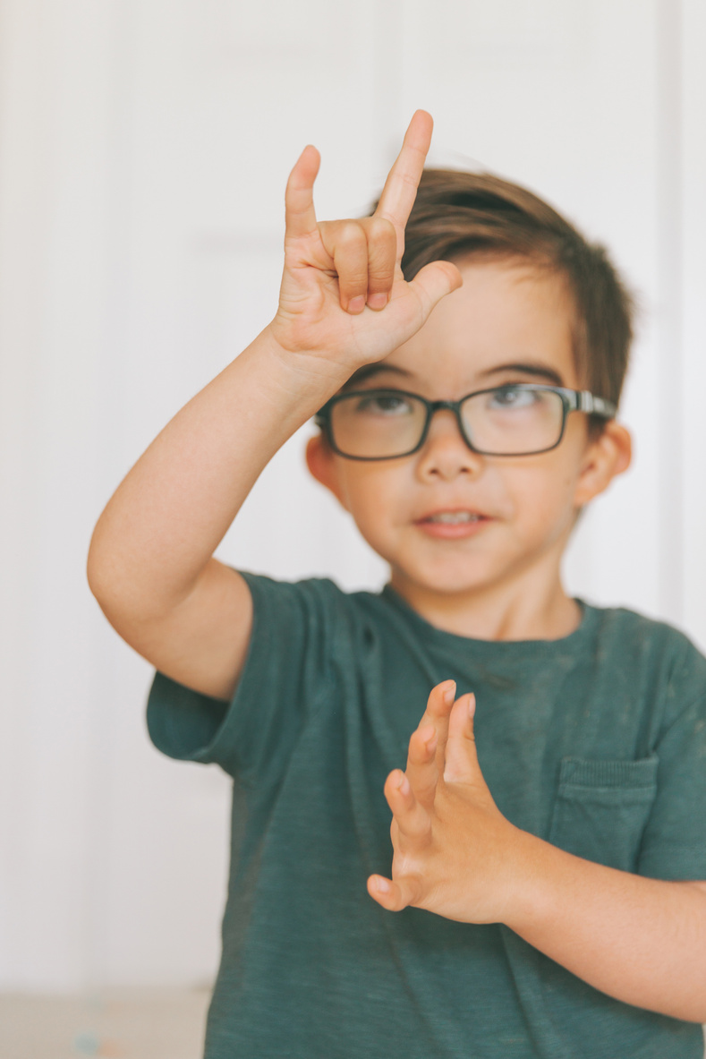 Little Boy Communicating in Sign Language